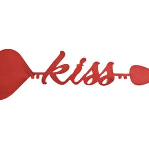 A red spoon that says kiss on it.
